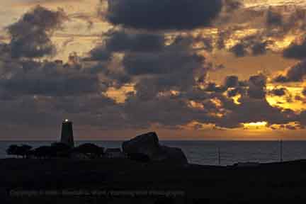 Sunset and clouds with lighthouse, Piedras Blancas, CA